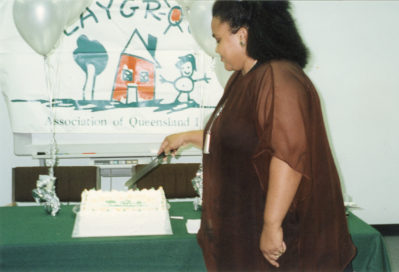 1998a Playgroup pres Elissa Howsen cuts the cake