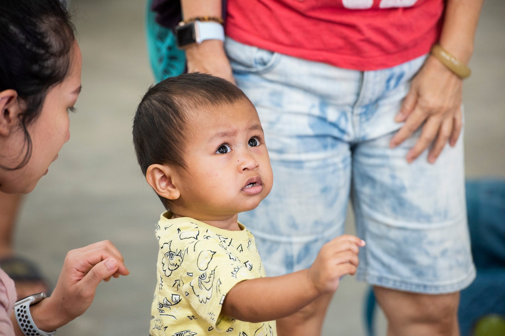 Boy showing mum what he wants by pointing