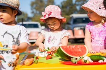 Children preparing fruit and vegetables