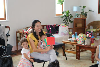 Parent facilitating a Japanese playgroup