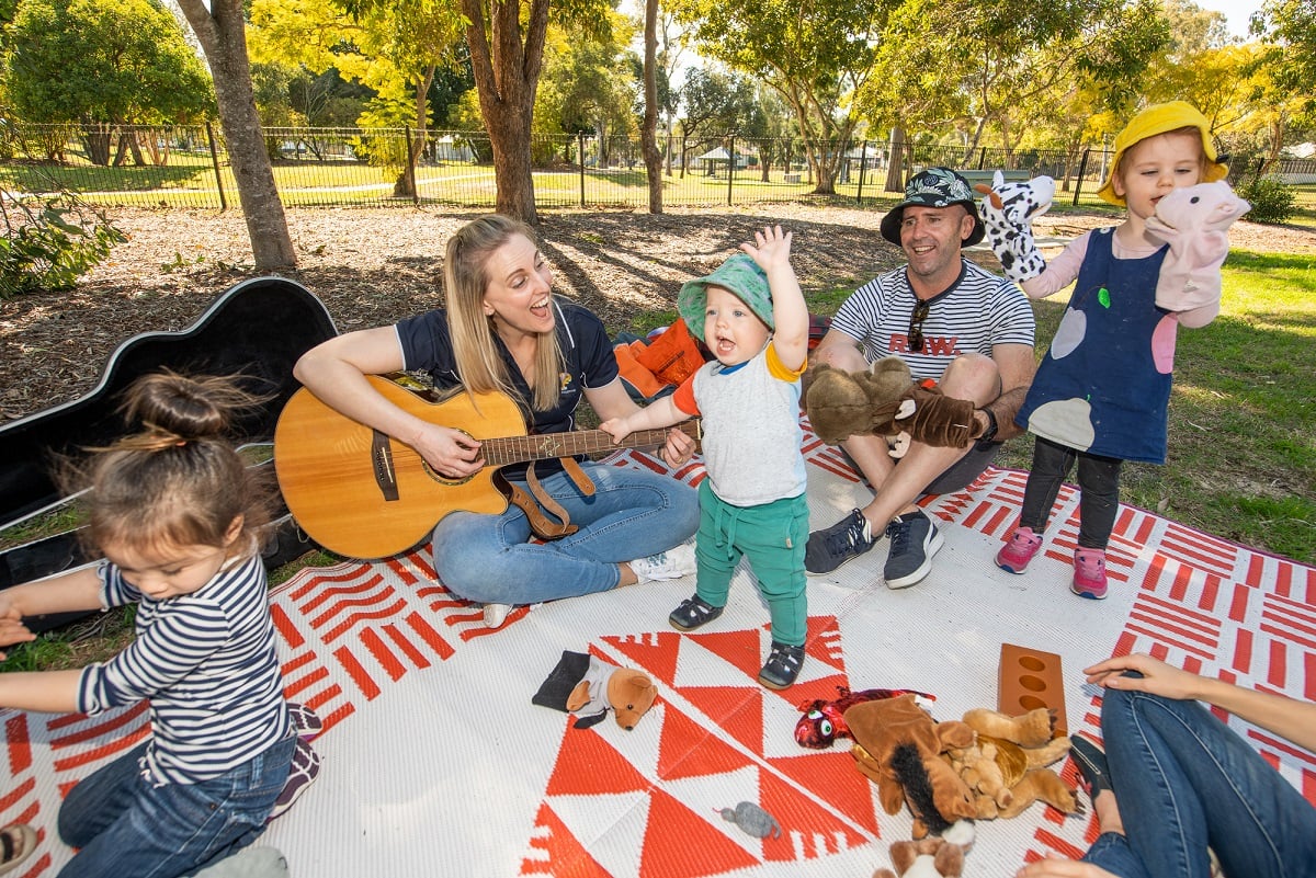 Play Matters Music Therapist leading an outdoor music session