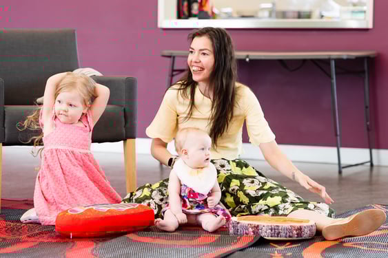 Families participating in music and dance together