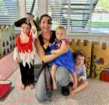 A mother and her children at an imaginative play event on the Sunshine Coast