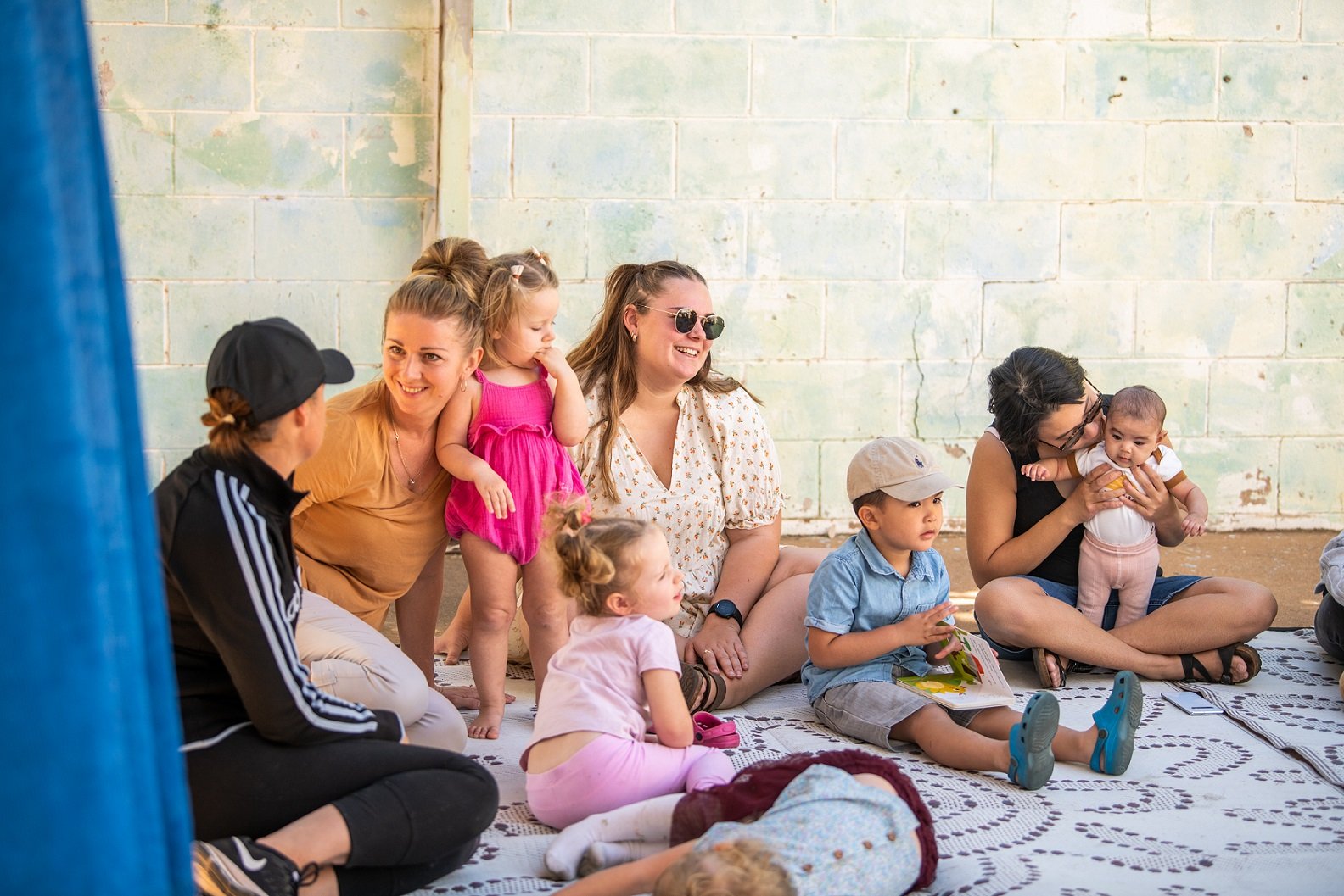 Families enjoying story time at Mt Isa Playgroup