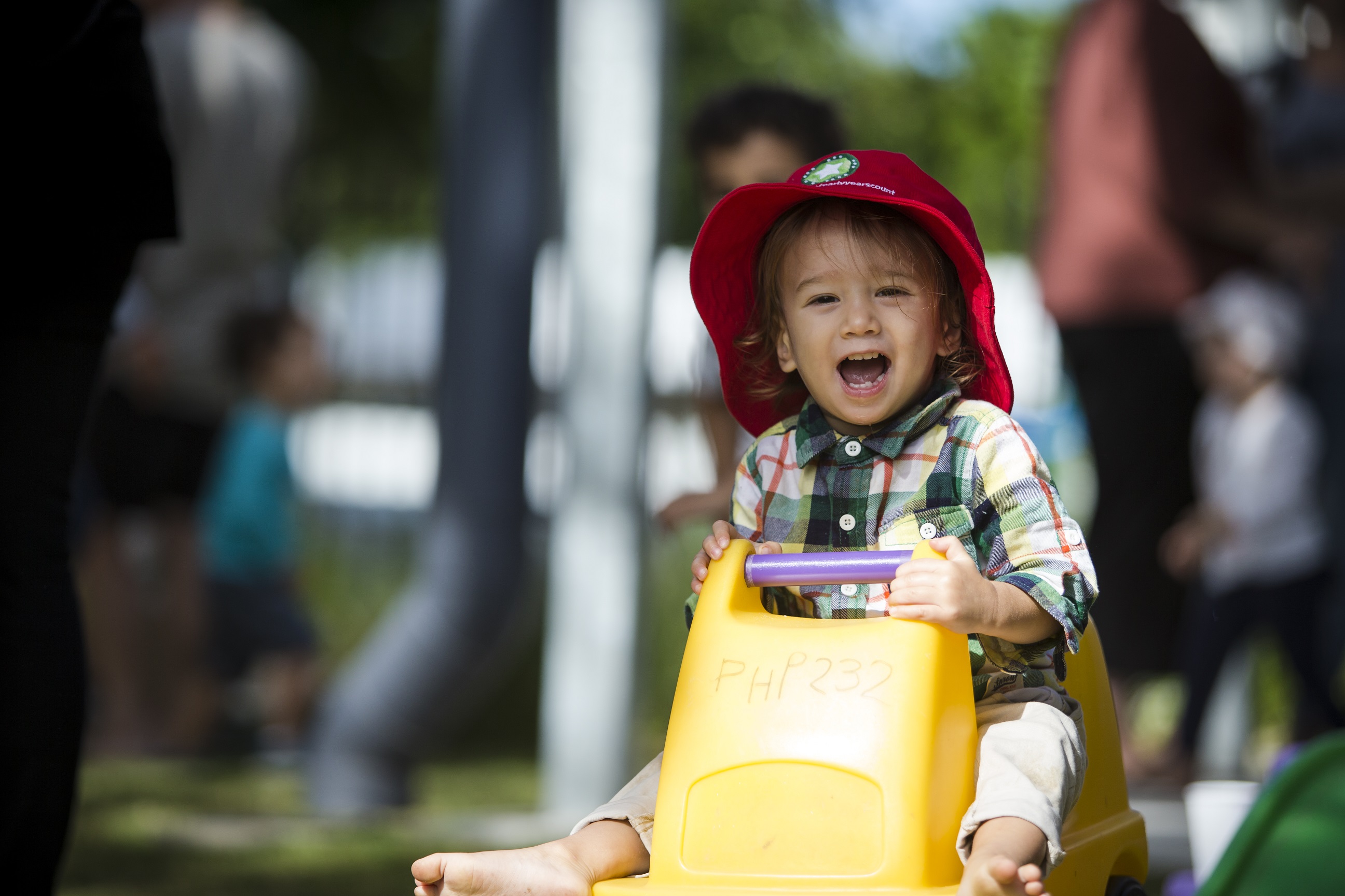 Child riding a tricycle at the Redland Bayside Child & Family Support Hub