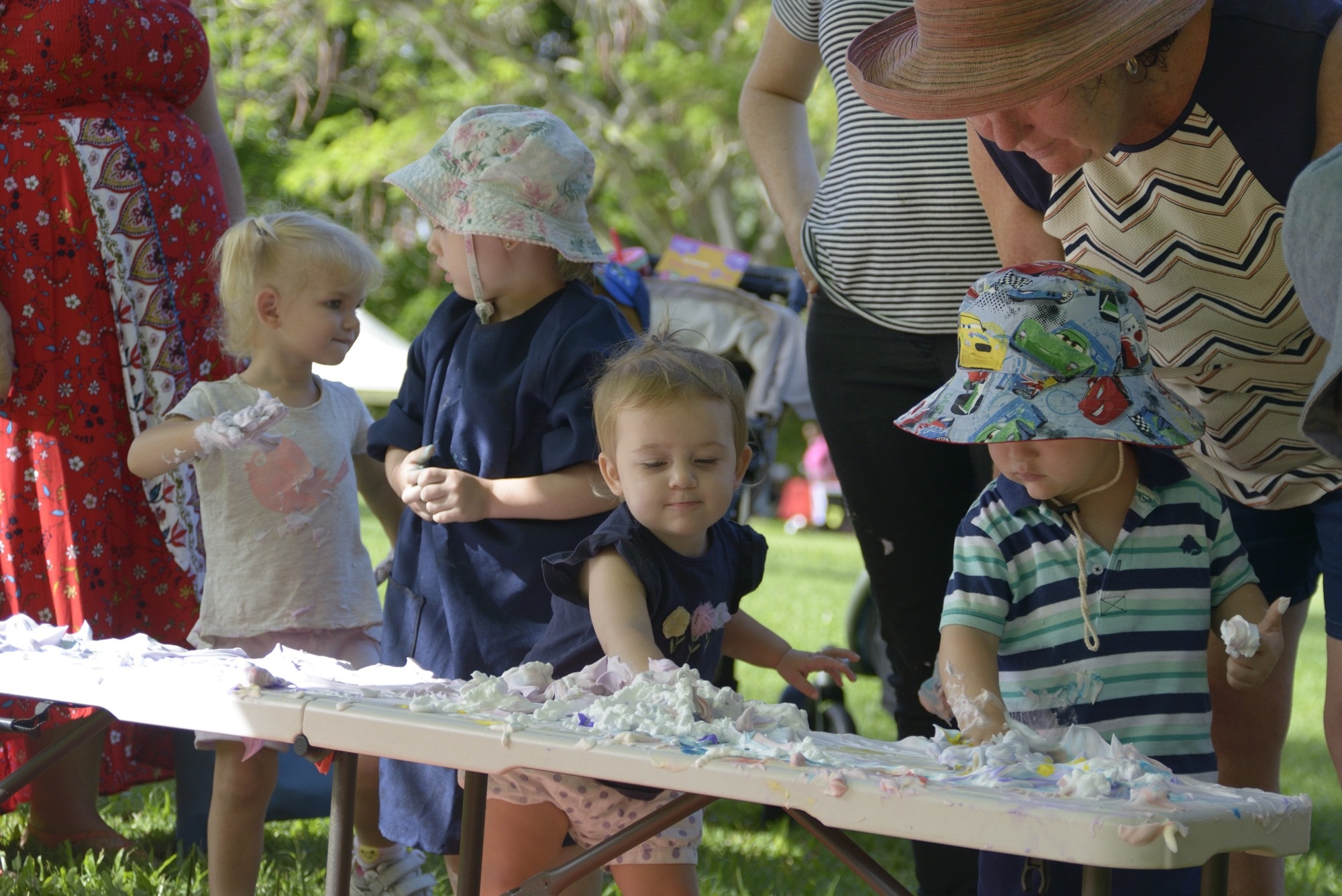 Messy Play May in Rockhampton. Children enjoying sensory play with shaving cream