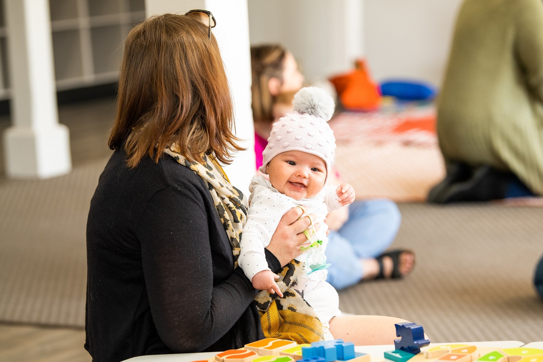 Parent and baby bonding at playgroup session