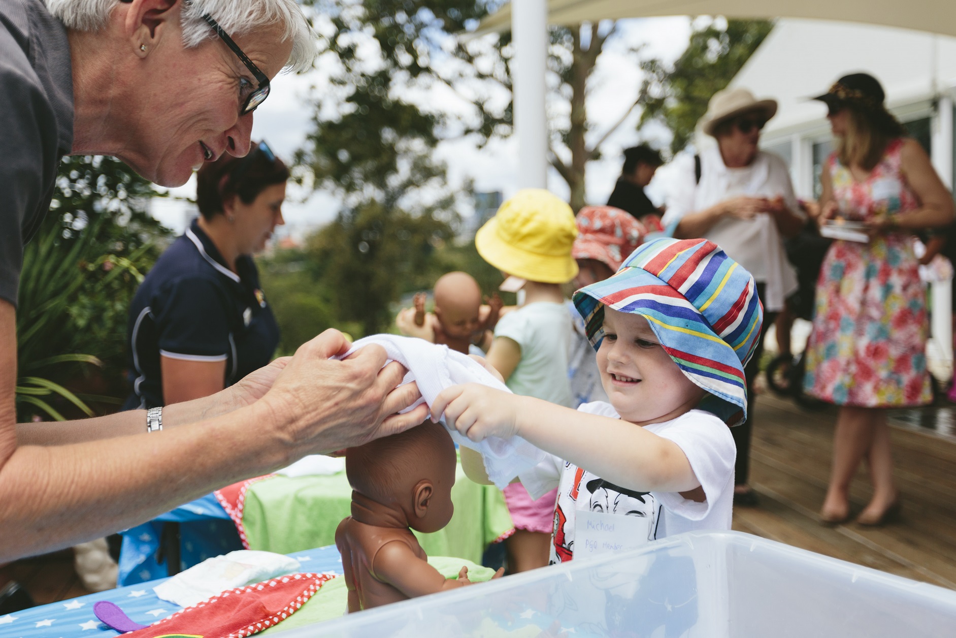 Child washing a baby