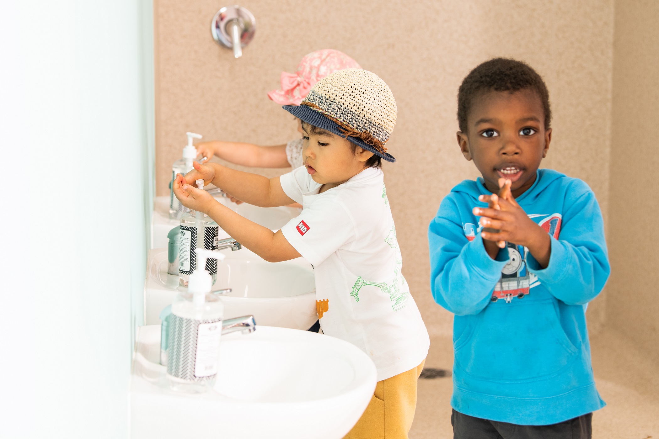 Children washing their hands