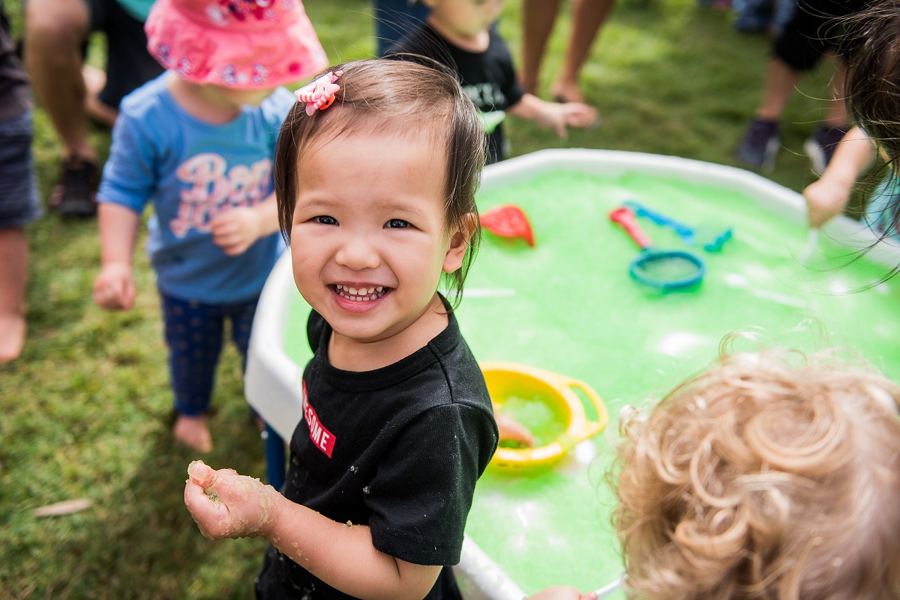 Child playing with slime