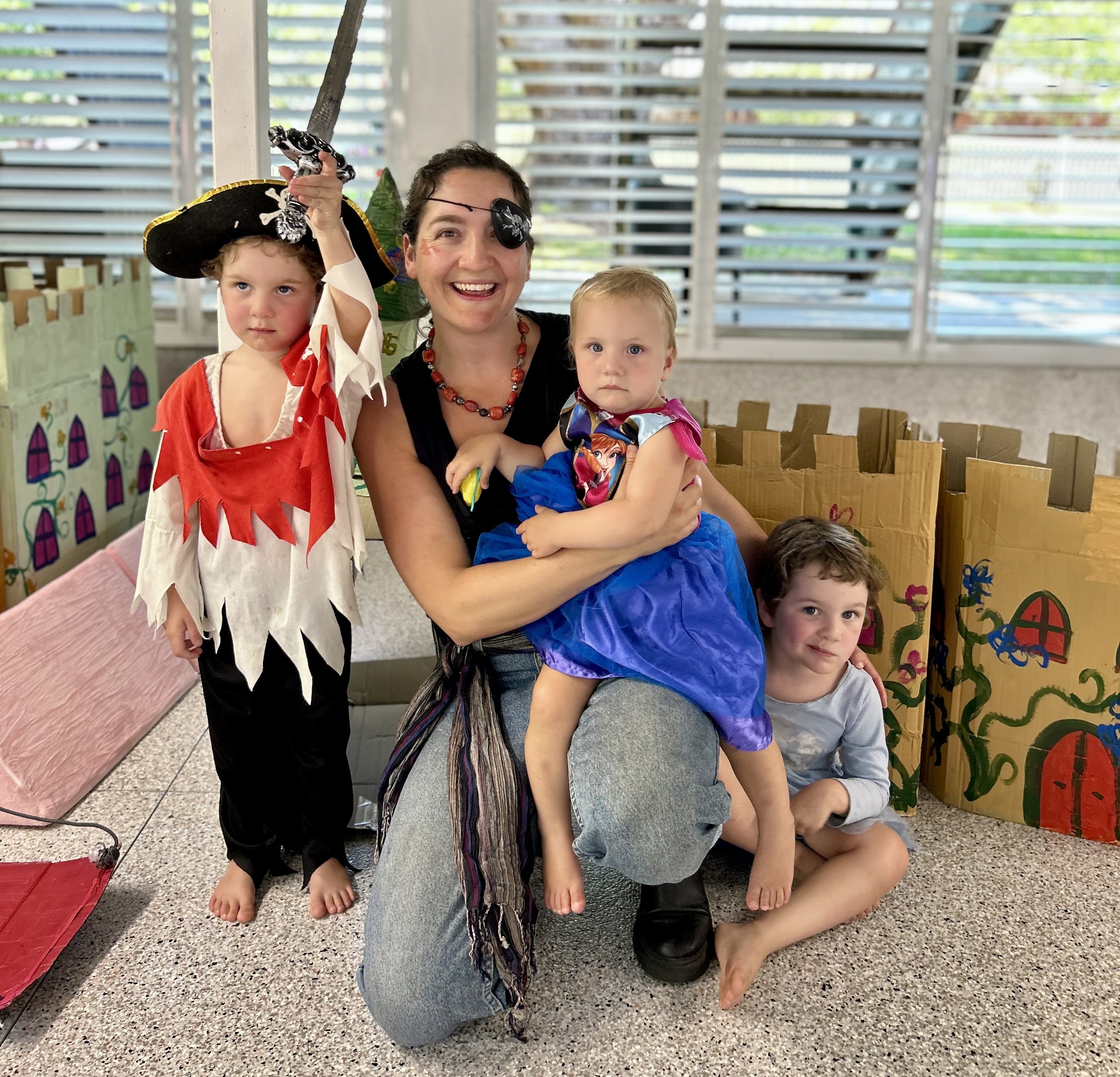 A mother and her children at an imaginative play event on the Sunshine Coast